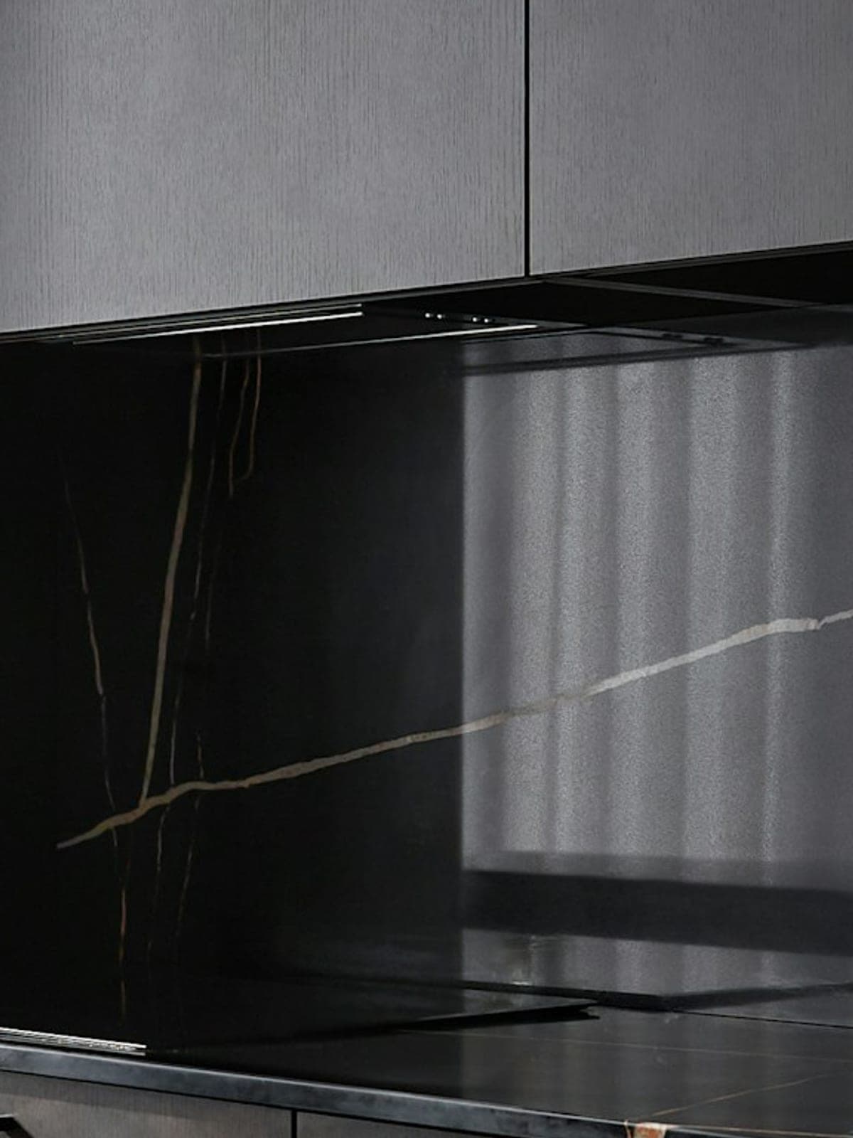 The same granite polished back to deep color and gloss