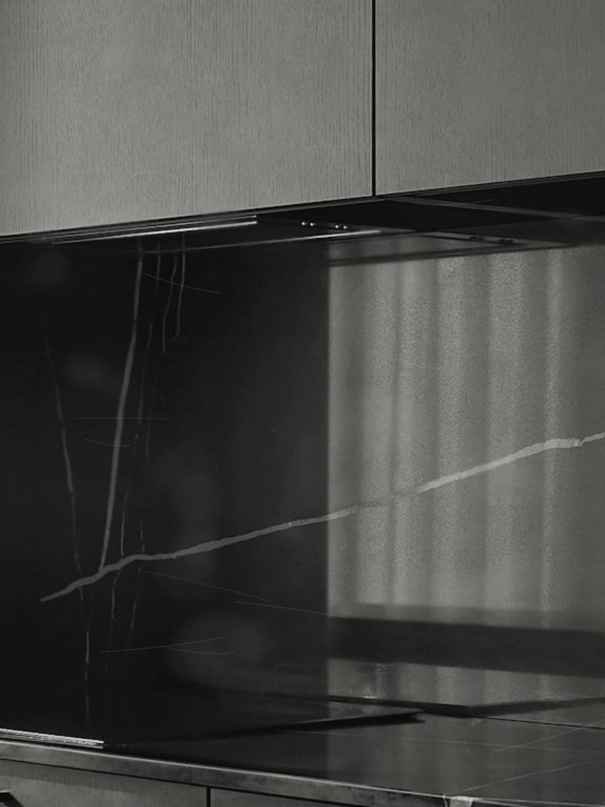 Worn granite countertop with hazy polish before restoration