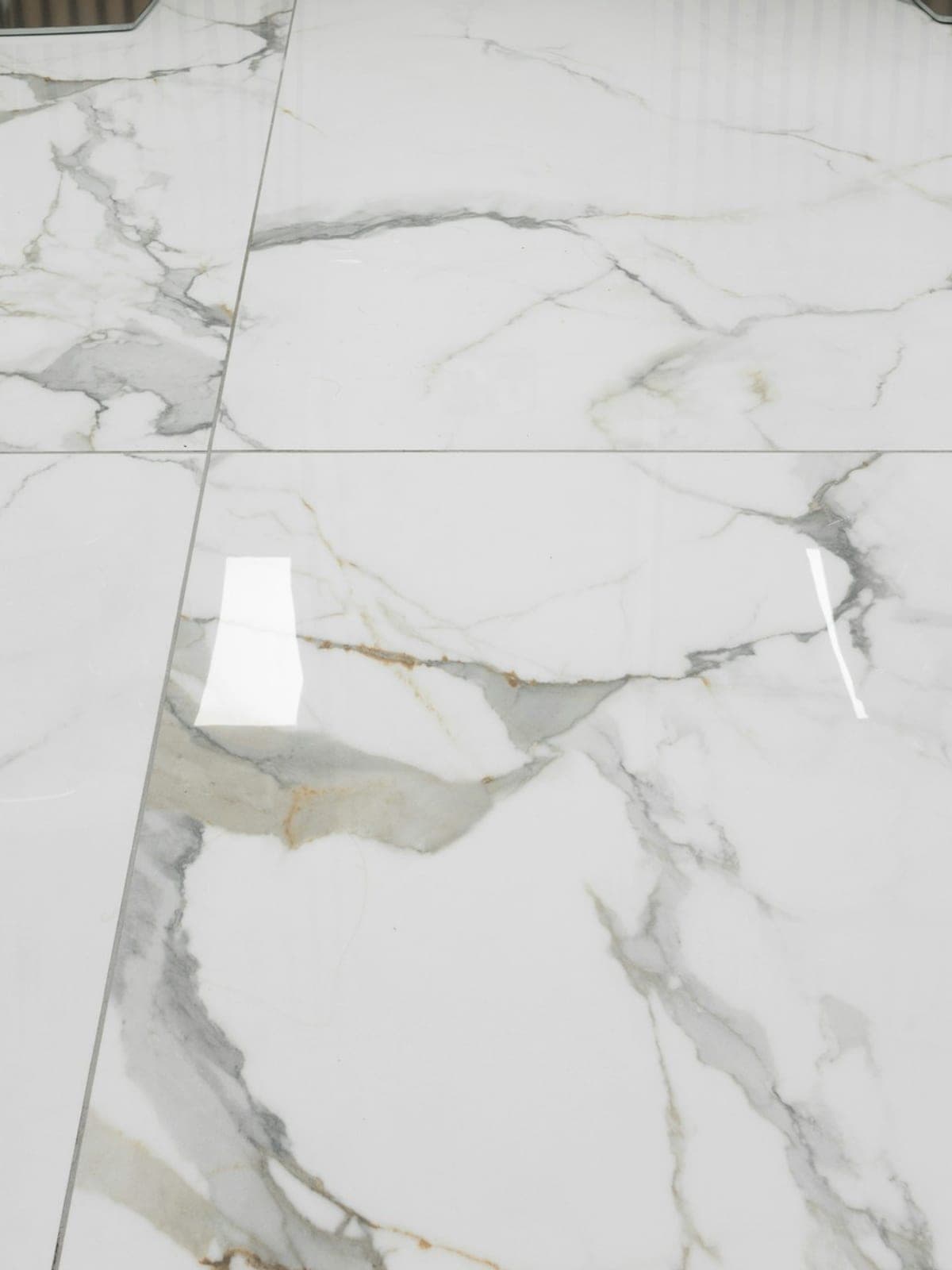 The same floor with clean, sealed grout in a uniform tone