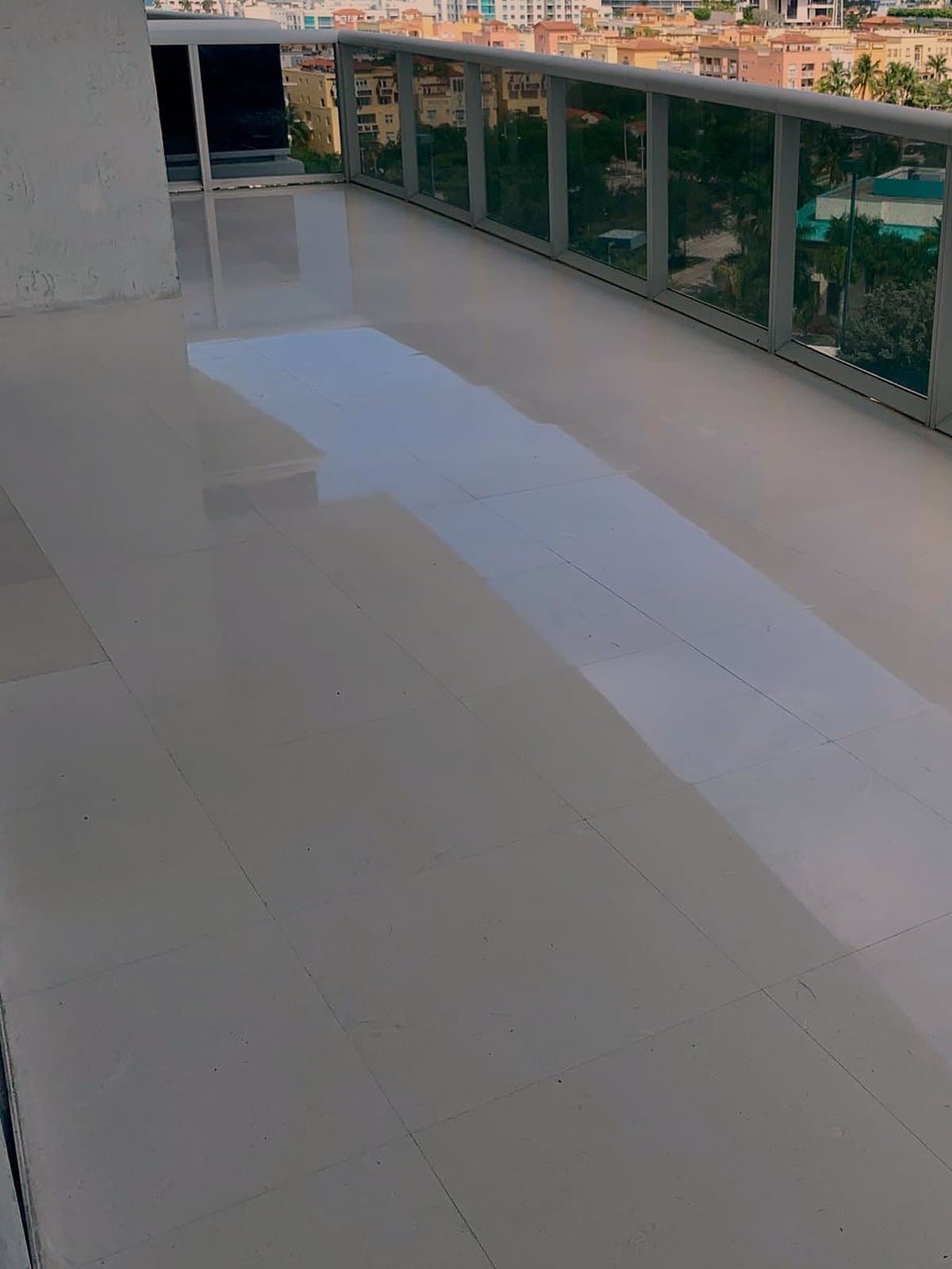 The same limestone balcony floor after grinding and cleaning