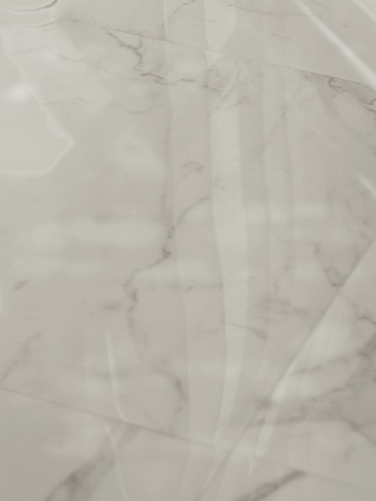 Etched, dull marble floor before restoration